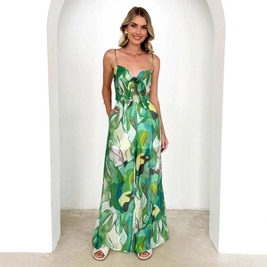 Tropical leaf print jumpsuit with spaghetti straps and front tie detail for women