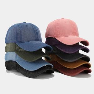 Classic vintage washed denim baseball caps stacked in nine assorted colors for unisex fashion