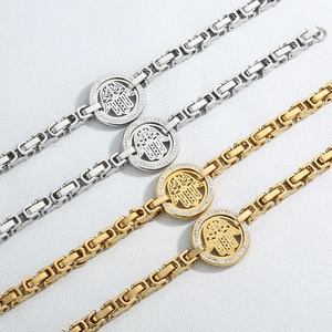 Parure de bijoux Main de Fatma en acier inoxydable avec cristaux dorés et argentés