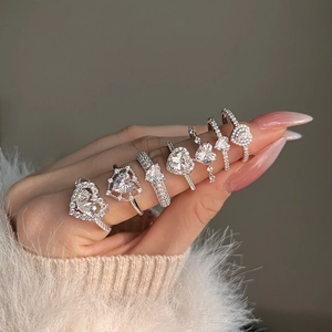 Exquisite S925 sterling silver rings with heart-shaped cubic zirconia on model's hand