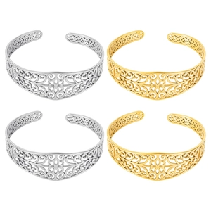 Detailed view of 18k gold and silver stainless steel open bangles with hollow patterns