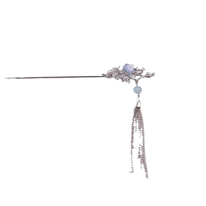 Elegant silver moonstone hair pin with blue star accents and long hanging tassels