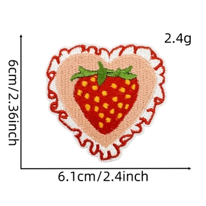 Detailed view of strawberry heart embroidery patch showing 6.1cm x 6cm size measurements