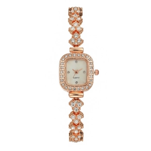 Elegant rose gold square women's quartz watch with sparkling rhinestones on white background