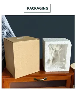 Detail of Halloween skull ornaments in secure cardboard box with protective foam