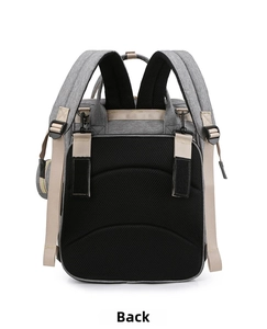 Detailed back view of a gray diaper bag featuring breathable black mesh and padded straps