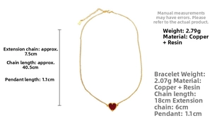 Detailed specs of gold-plated necklace and bracelet with red resin heart charms