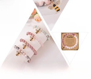 Detail of natural agate stone beads with an enamel bee charm for teacher gifts