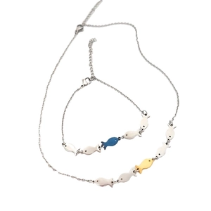 Silver necklace and bracelet set featuring blue and yellow fish pendants with lobster clasp
