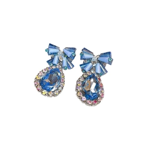 Elegant blue crystal bow and teardrop clip-on earrings with shimmering rhinestones