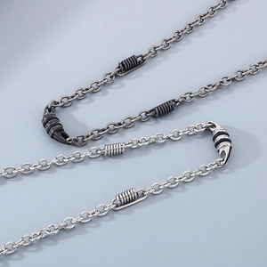 Men's titanium steel spring Cuban chain necklace with pearl and industrial style details