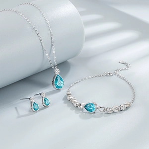 S925 sterling silver jewelry set featuring teardrop blue crystals and zircon accents