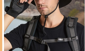 Detail of adjustable chest buckle and padded straps on an outdoor hiking backpack