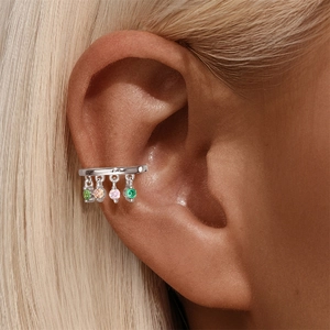 Macro view of S925 silver ear cuff featuring marquise stones and colorful drop charms