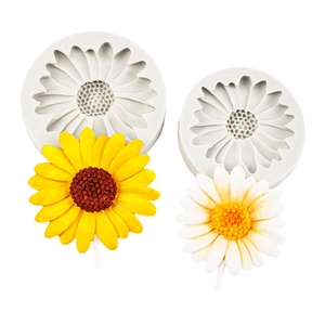 Daisy and sunflower silicone fondant molds with handmade flower cake decorations