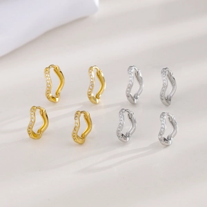 Sparkling pavé zircon wave hoop earrings in gold and silver finish minimalist jewelry