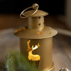 Vintage Christmas candle holder in champagne gold metal with reindeer and star cutouts
