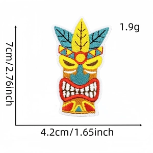Detailed view of Tiki style embroidered patch with 7cm height and 4.2cm width dimensions