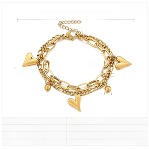 Detailed view of golden double-layer stainless steel bracelet with heart charms and dimensions
