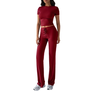 Women's dark red two-piece casual set featuring a short sleeve crop top and drawstring pants