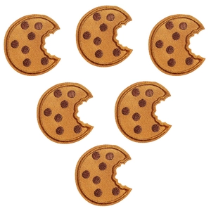 Set of six chocolate cookie embroidery patches with funny eyes on white background