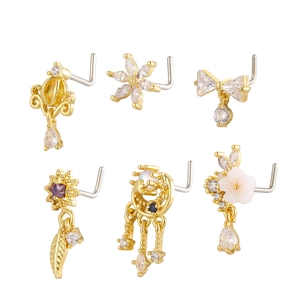6-piece gold nose stud set with zircon and pearl in floral, butterfly, and moon designs