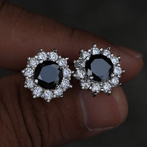 Elegant halo flower stud earrings featuring black center stone and sparkling white cz