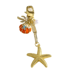 Gold starfish and shell keychain with white pearls and orange enamel ocean charms