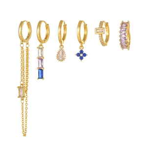 Detail view of a 6-piece gold earring set featuring colorful zircons and chain tassels