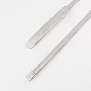 Detail view showing silver oval metal links and mesh textured stretch belt segments