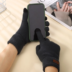 Classic black knitted touch screen gloves for men with winter is here woven label detail
