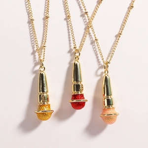 Hip hop microphone pendants in gold, red, and pink colors on stainless steel chains