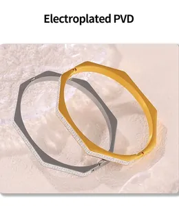 Detail of PVD electroplated gold and silver octagonal bracelets with inset zircons
