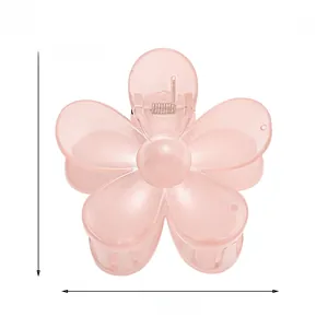 Detailed view of pink flower hair claw clip with 7.5cm size resin and metal spring