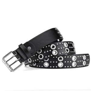 Close-up of black punk belt with double needle buckle and silver hollow eyelets