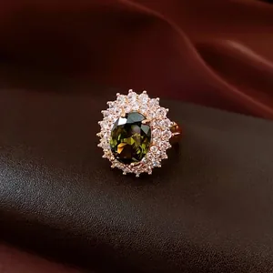 French court style oval green gemstone ring with rose gold micro-paved zircon stones