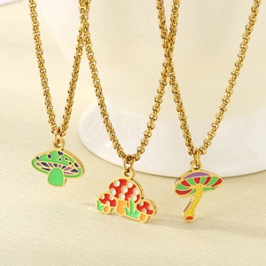 Detailed close-up of colorful enamel mushroom pendants with golden pearl chains