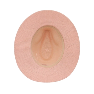 Top view of pink woven sun hat showing detailed straw texture and internal sweatband