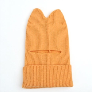 Detailed close-up of orange knitted balaclava featuring cute cat ears and ribbed texture