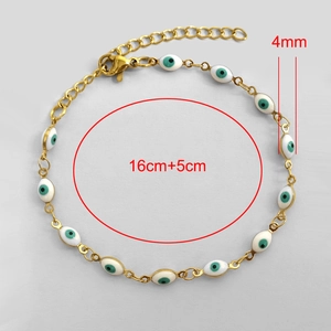 Detail of gold evil eye bracelet showing 16cm length with 5cm extension and 4mm beads