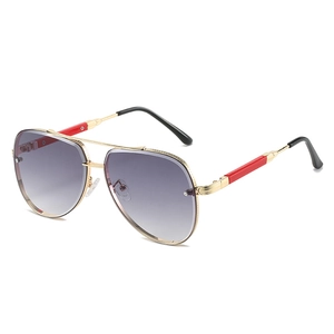 Frameless pilot sunglasses with gold metal frame and purple gradient lenses for women