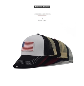 Detail of embroidered American flag on breathable mesh trucker hats in multiple colors