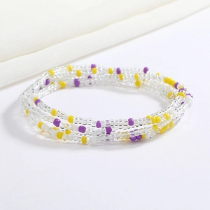 Close-up of handmade colorful glass bead waist chain with multi-layer elastic design