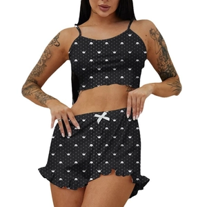 Women's 2-piece black sleepwear set with white crown and polka dot print on crop top and shorts
