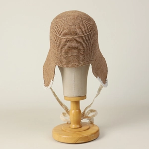Handmade raffia straw sun hat with ear flaps and white lace ties for summer style