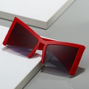 Modern oversized geometric red cat eye sunglasses with dark purple gradient lenses