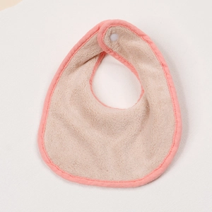 Absorbent cotton baby bib in light beige with pink trim and snap button closure