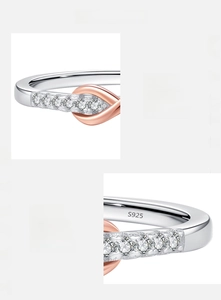 Macro detail of S925 sterling silver ring with hand-set 5A zircon and infinity design