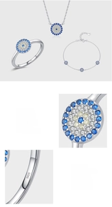 Detail view of S925 sterling silver blue evil eye jewelry set with pave setting stones