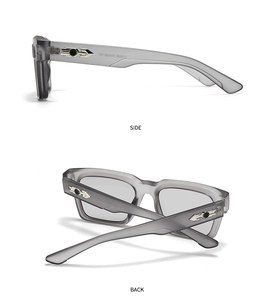 Detail view of grey translucent square sunglasses frame with metal arrow rivets